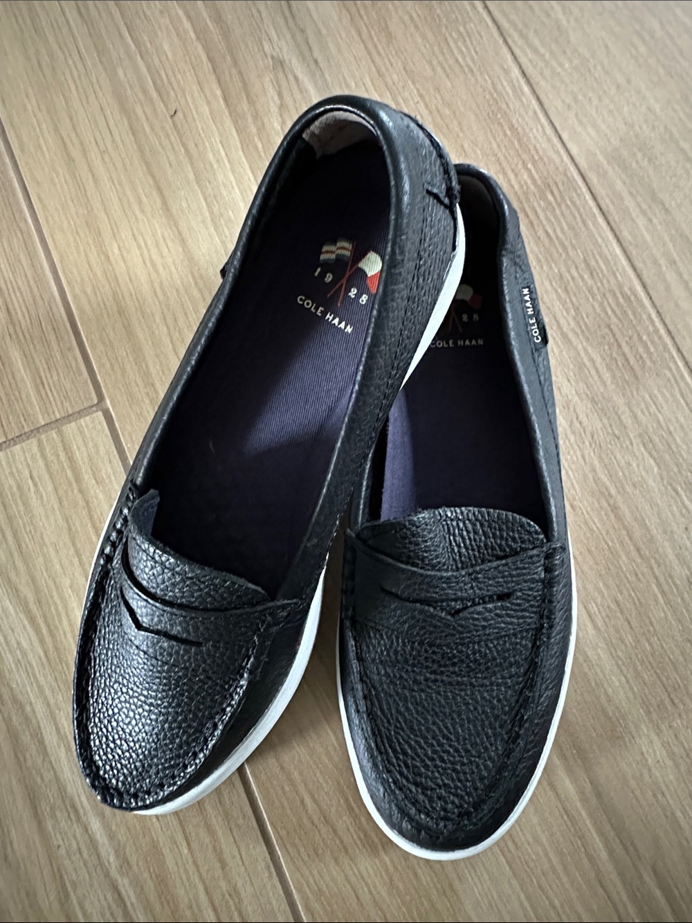 Cole Haan Black Leather Slip-On Penny Loafers with White Sole